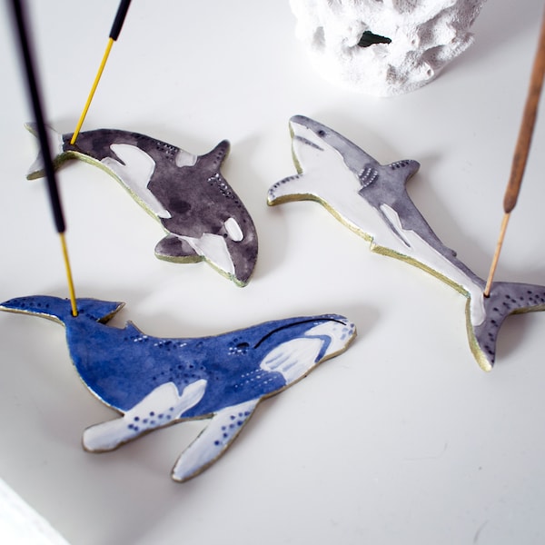 sea themed incense stick holder, made from air dry clay, ocean themed, great white shark, orca, humpback whale, painted with watercolour