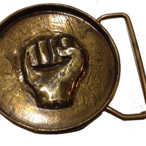 Fist belt buckle hot sale