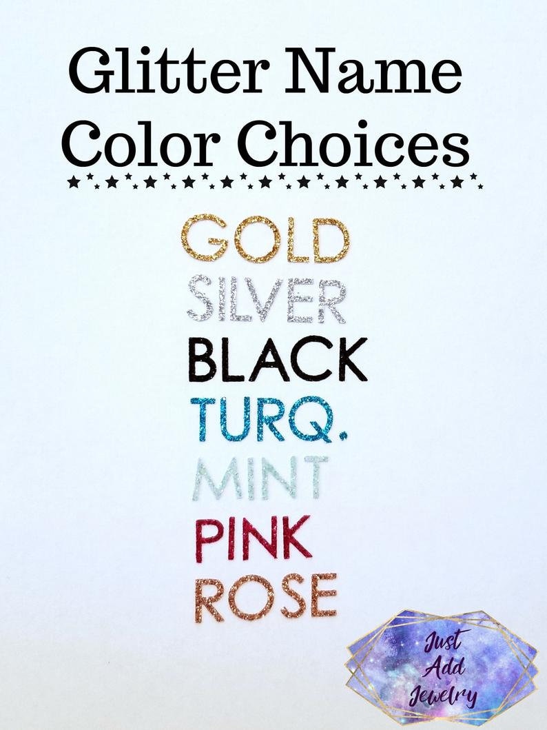 May include: A white background with the text "Glitter Name Color Choices" in black. Below the text are the words "GOLD", "SILVER", "BLACK", "TURQ.", "MINT", "PINK", and "ROSE" in various glitter colors.