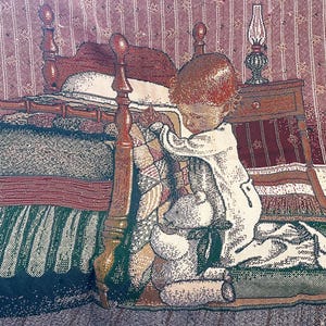 May include: A woven tapestry throw blanket featuring a child kneeling beside a bed, with a teddy bear. The blanket has a detailed design with a border of geometric shapes and a fringed edge. The color palette includes shades of red, green, and beige.