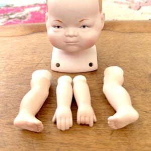 Vintage Baby Doll Heads, Arms, and Feet