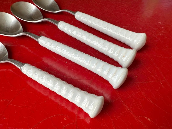 Noritake 18-8 Japan With Porcelain Handle, White / Extra Spoons