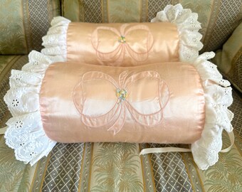 Vintage Roll Pillows in Peach Satin with Eyelet Lace and Bow and Flower Applique