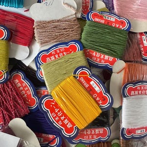 Large Vintage Tin Full of Unused Japanese Bunka Thread Over 50 Skeins Assorted Colors