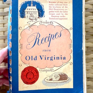 May include: A blue and white cookbook with the title "Recipes from Old Virginia". The cover features a drawing of a colonial-style house and a seal with the text "Cooperative Home Extension Family Service Community".