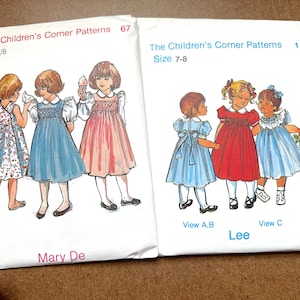 May include: Two sewing patterns for children's dresses. The first pattern is for sizes 7/8 and shows three girls wearing different dresses. The second pattern is for sizes 7-8 and shows three girls wearing different dresses. The patterns are from The Children's Corner Patterns.