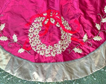 Beautiful Christmas Tree skirt in Deep Crimson with Embroidered Wreath, Red Ribbon, and Beaded Edges