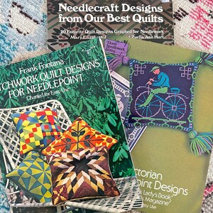May include: Three needlepoint design books with colourful covers. The top book is titled "Needlecraft Designs from Our Best Quilts". The middle book is titled "Patchwork Quilt Designs for Needlepoint" and features a chair with colourful pillows. The bottom book is titled "Victorian Point Designs" and features a green and black design of a person riding a bicycle.