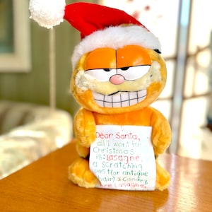 Vintage Stofftier Garfield Weihnachtsmann mit Weihnachtswunschliste / Plüsch Garfield für Weihnachten