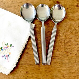 Delco Stainless Korea Linnea Pattern Teaspoons or Round Soup Spoons