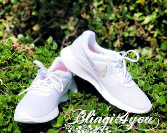 hot pink nike tanjun