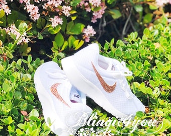 hot pink nike tanjun