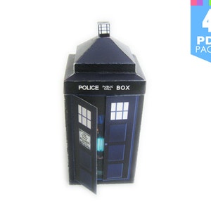 May include: A blue and black papercraft model of a police box with the words "Police Public Call Box" printed on the side. The door is open and the interior is visible.