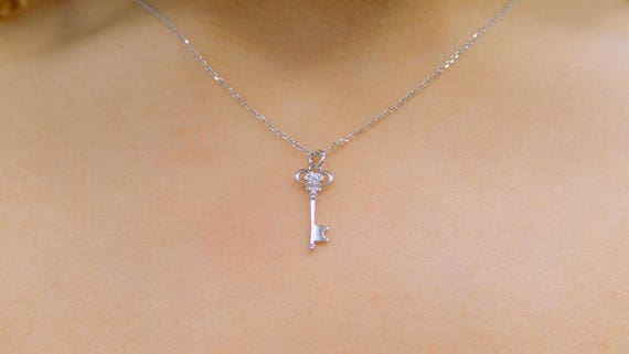 White gold key pendant deals