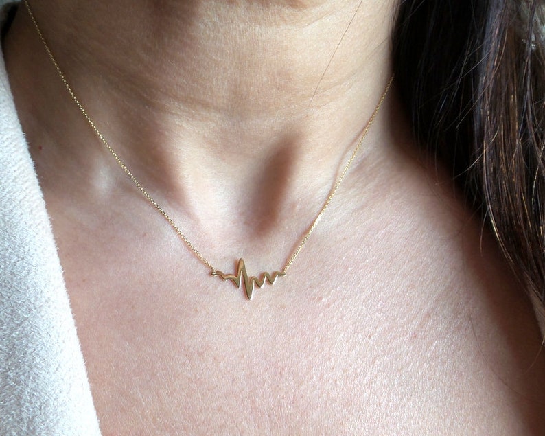 gold heartbeat necklace