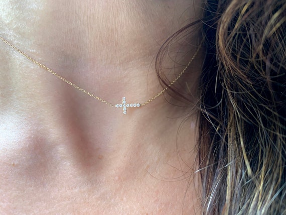 Zales Outlet 1/20 CT. T.W. Diamond Sideways Cross Necklace in 10K Gold |  Hamilton Place