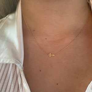 Mini sideways cross best sale necklace