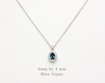 Oval Blue Topaz Solitaire Necklace / 14k Gold .060 carat oval Blue Topaz Necklace / December Birthstone / Layering Topaz Pendant