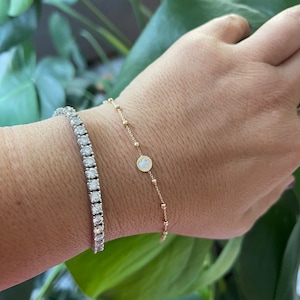 14k guldarmband med änglavingar: Justerbart berlockarmband