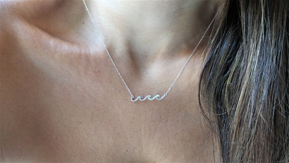 Diamond wave deals pendant