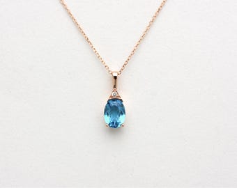 14k Gold Blue Topaz Solitaire Necklace  Diamond Accent - December Birthstone