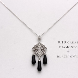 Vintage ketting met zwarte onyx en diamant: 14k witgouden filigraan