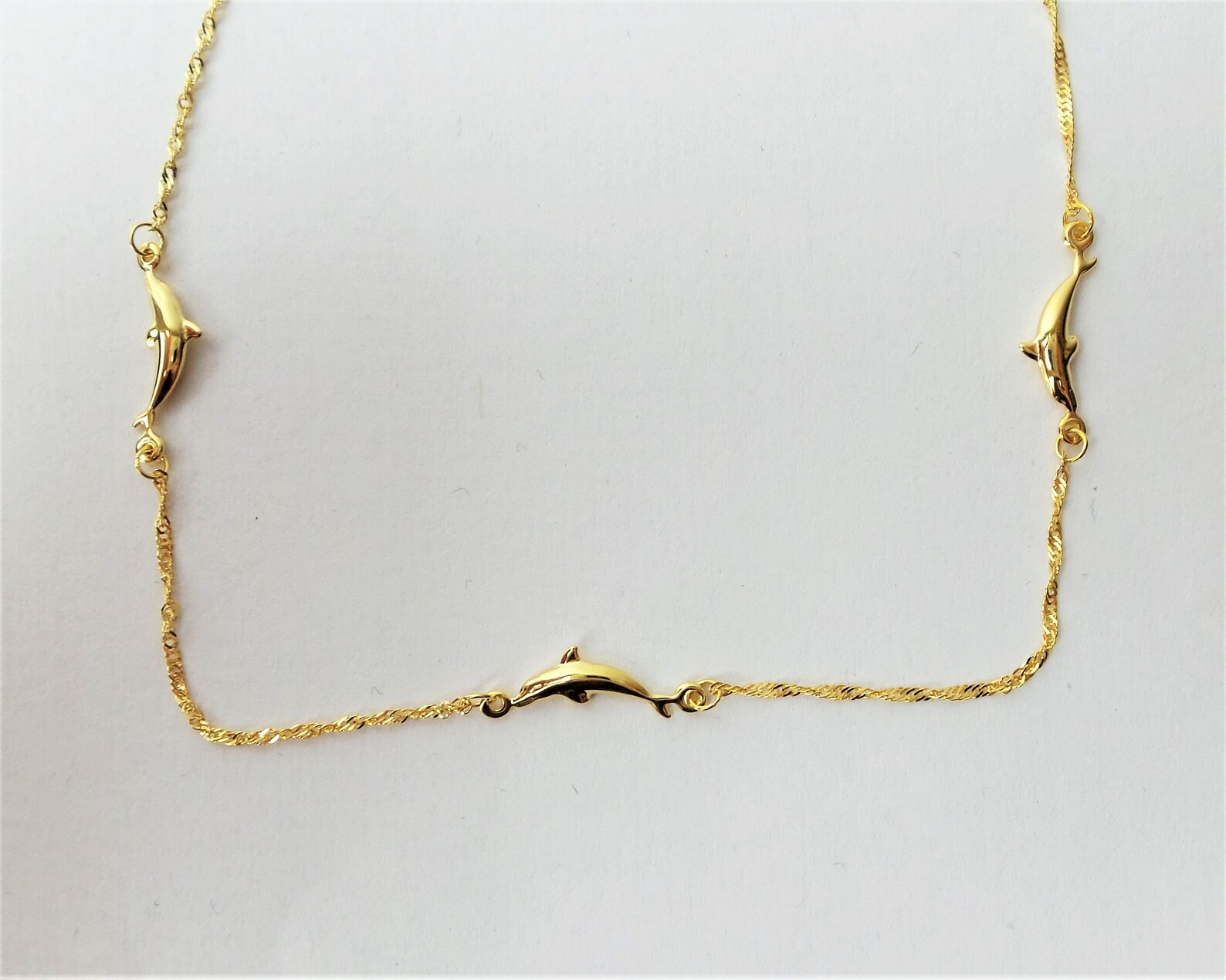 gold dolphin ankle bracelet