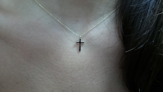 Small black cross best sale necklace