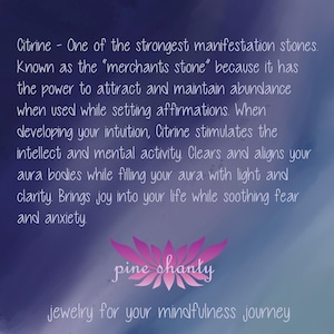 May include: A purple and blue background with white text that reads "Citrine - One of the strongest manifestation stones. Known as the "merchants stone" because it has the power to attract and maintain abundance when used while setting affirmations. When developing your intuition, Citrine stimulates the intellect and mental activity. Clears and aligns your aura bodies while filling your aura with light and clarity. Brings joy into your life while soothing fear and anxiety." Below the text is a pink lotus flower with the text "pine shanty" and "jewelry for your mindfulness journey".
