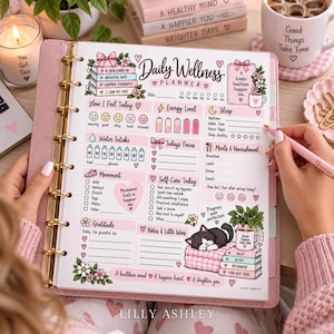 May include: A Daily Wellness Planner page in a pink disc-bound binder featuring sections for mood, energy, sleep, water intake, meals, movement, and gratitude. The page includes illustrations of books, a sleeping cat, and flowers with pastel pink accents.