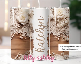 May include: White tumbler with a lace and pearl design. The tumbler has a blank center for personalization and the text "Katelyn" is written on the side. The text "Lilly Ashley" is written at the bottom of the tumbler.