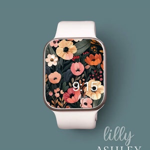 Peut inclure: Une montre connectée blanche avec un cadran floral. Le cadran de la montre présente un fond sombre avec des fleurs et des feuilles colorées. L'heure est 9h15 et la date est le 16 août. Le texte "lilly ASHLEY" est sous la montre.