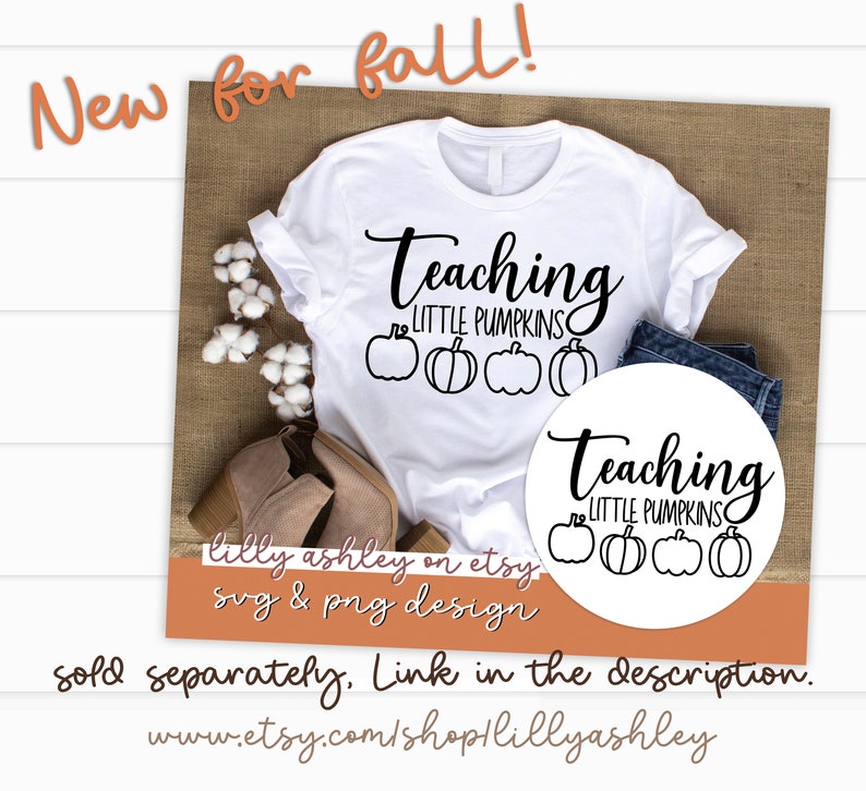 May include: White t-shirt with black text that reads "Teaching Little Pumpkins" and a row of four pumpkins. The shirt is on a brown surface with a pair of brown boots and a white circle with the same text and pumpkins.