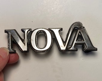 Original Vintage 1970's Chevrolet Nova Chrome Emblem, 1700878 with screws.