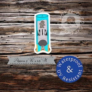 May include: A blue and yellow sticker with a cartoon image of a person in a blue and white striped shirt and a blue hat. The sticker is approximately 3 inches wide and 2.5 inches high. The sticker is waterproof and UV resistant.