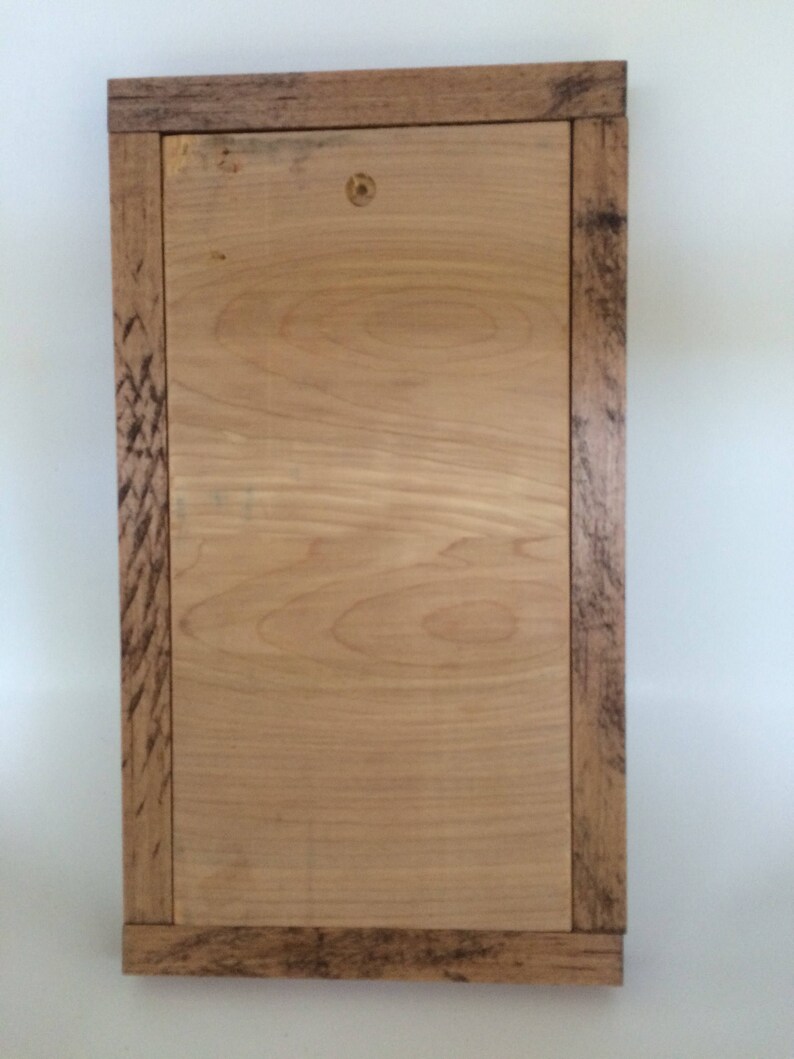 Chalkboard with blue rooster outline