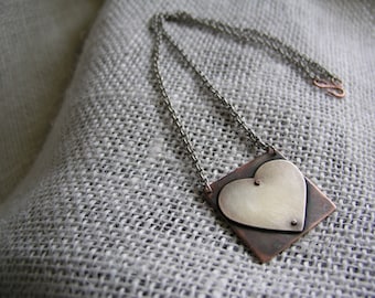 Riveted silver heart