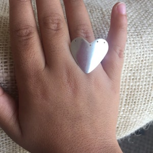Holes-in-my-heart silver ring
