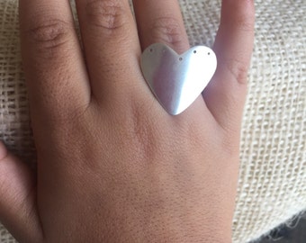 Holes-in-my-heart silver ring