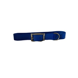 May include: A blue nylon dog collar with a silver buckle and a silver D-ring. The buckle has the word "Coastal" engraved on it.