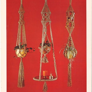 May include: Three macrame plant hangers with different designs. The leftmost hanger has a simple design with a single pot. The middle hanger has a more intricate design with a shelf and a pot. The rightmost hanger has a more complex design with a double pot.