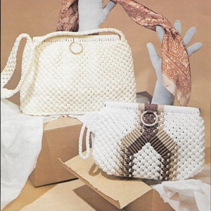 May include: Two crocheted bags, one white with a brown and white pattern, and the other white with a brown strap. The bags are displayed on a brown surface with the text "The Classic" and "The Beautifier" printed below them.