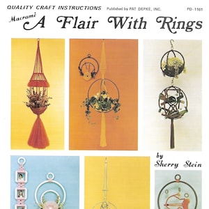 May include: A craft pattern booklet titled "A Flair With Rings" with instructions for macrame projects. The cover features five different macrame projects, including a hanging planter, a wall hanging with a ring, and a picture frame holder.