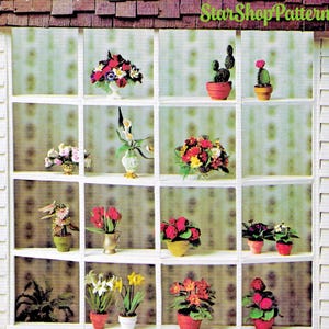 May include: A vintage book cover titled "Bread Dough Floral Miniatures" with a window display of miniature flower arrangements. The cover features text and a miniature window display with various potted flowers and cacti. The scale is 1" to 1' for dollhouses and miniature rooms.
