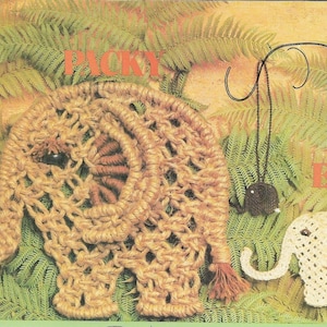 May include: Two macrame elephant wall hangings. One is brown and the other is white. The brown elephant has the text "PACKY" above it and the white elephant has the text "ELLY" above it.