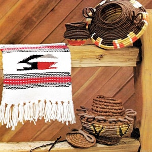 May include: A white woven rug with red, black, and gray geometric designs and fringe. Three brown woven baskets with colorful accents are displayed on a wooden shelf.