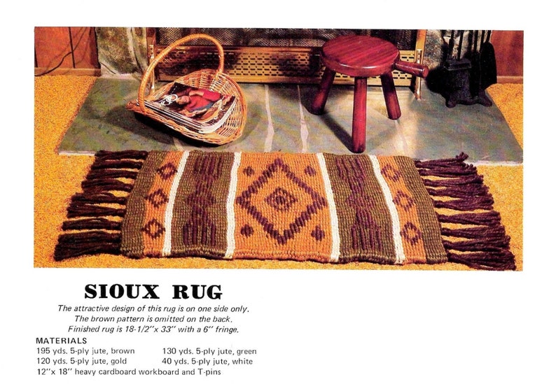May include: Sioux rug with a geometric pattern in brown, gold, and white. The rug has a diamond design in the center and vertical stripes. It measures 18.5" x 33" with a 6" fringe. The text "SIOUX RUG" is at the bottom.