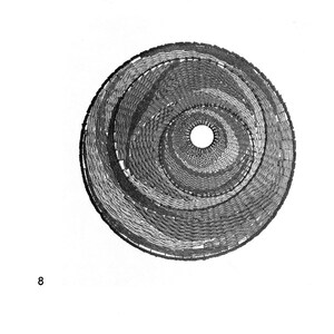 May include: A black and white image of a circular woven object with a hole in the center. The object is made of many concentric circles of woven material.