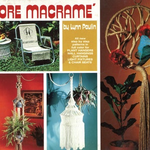 May include: Book cover for "More Macrame" by Lynn Paulin. The cover features a variety of macrame projects, including plant hangers, wall hangings, curtains, light fixtures, and chair seats. The book is illustrated with colorful photos of the finished projects.