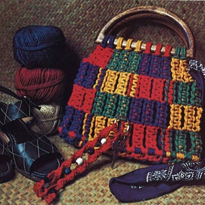 May include: A colorful crocheted bag with a wooden handle, a blue bandana, and a beaded keychain with keys. There are also three balls of yarn in the background.